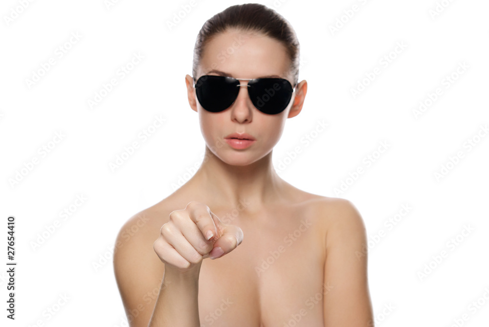 Portrait of woman in sunglasses. Shows forward. Portrait of woman in sunglasses. Shows forward.