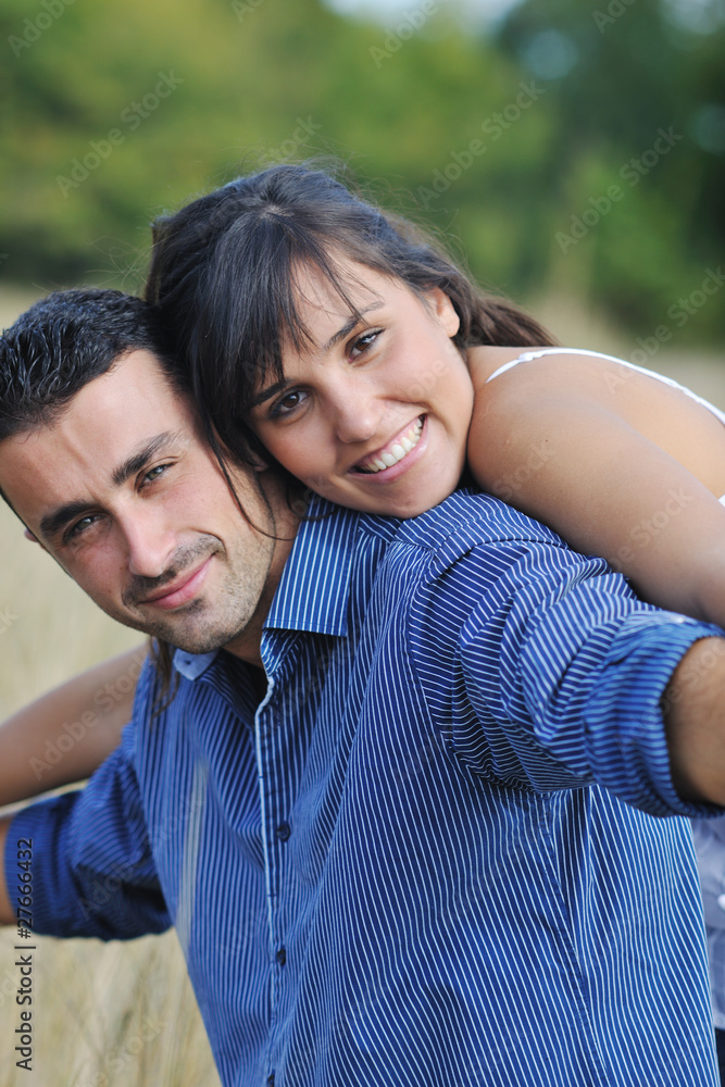 Fototapeta premium happy young couple have romantic time outdoor