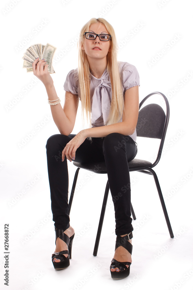 Fototapeta premium Businesswoman with money on office chair