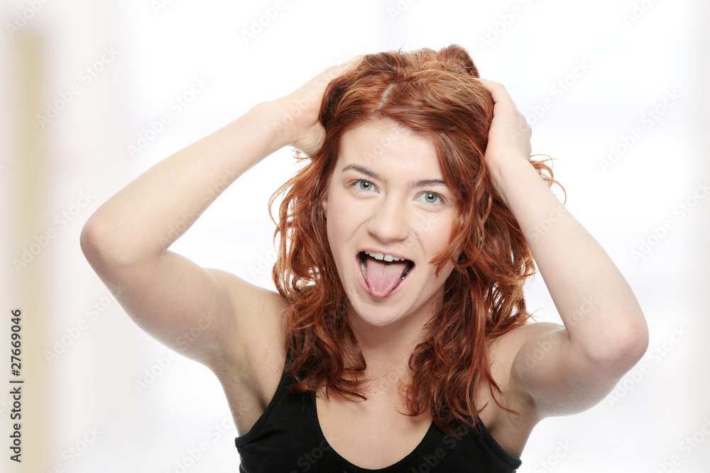 Young woman screaming