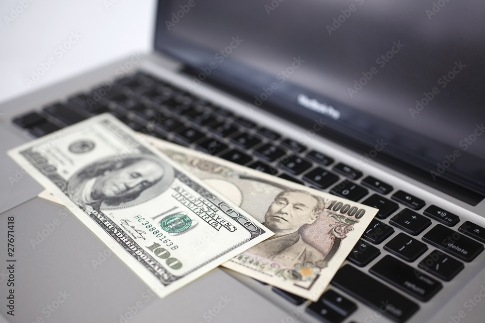 Computer keyboard and money Computer keyboard and money
