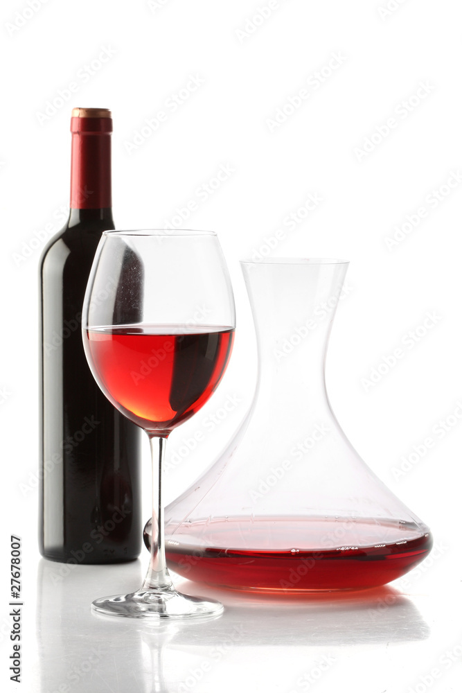 Red wine. A bottle, a glass and a decanter isolated Red wine. A bottle, a glass and a decanter isolated