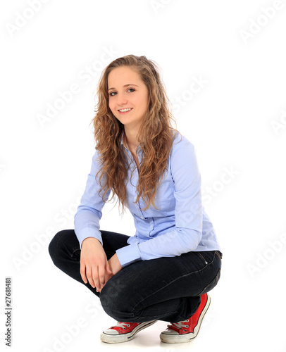 Attraktive junge Frau in der Hocke Stock Photo | Adobe Stock