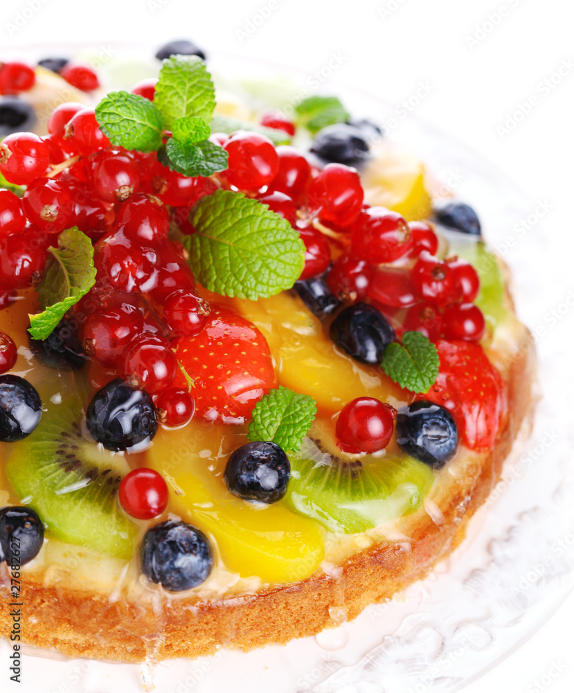cake with fresh berries and fruit closeup cake with fresh berries and fruit closeup