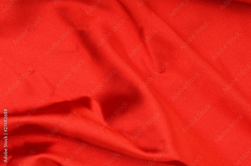 Bright satin fabric folded to be used as background Bright satin fabric folded to be used as background