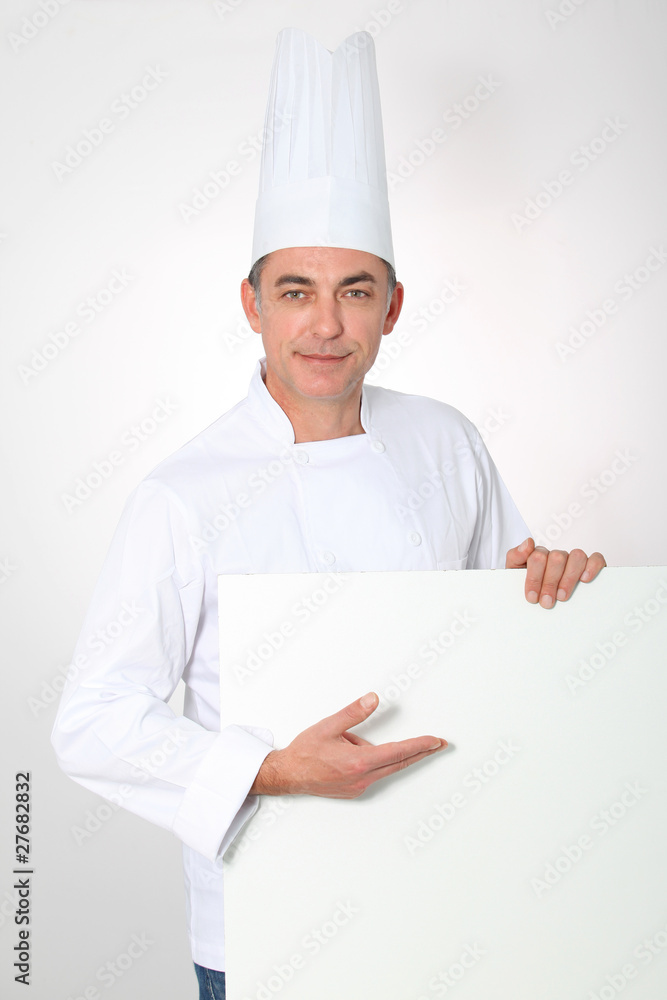 Closeup of chef showing white board Closeup of chef showing white board