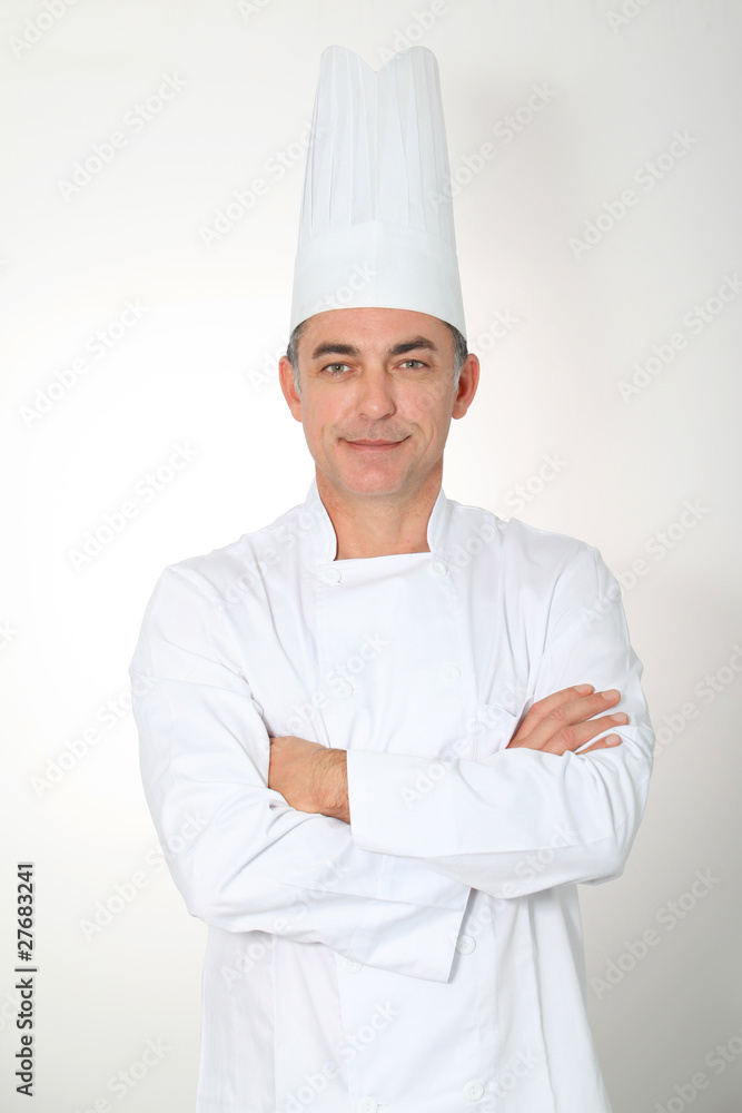 Clsoeup of standing chef on white background