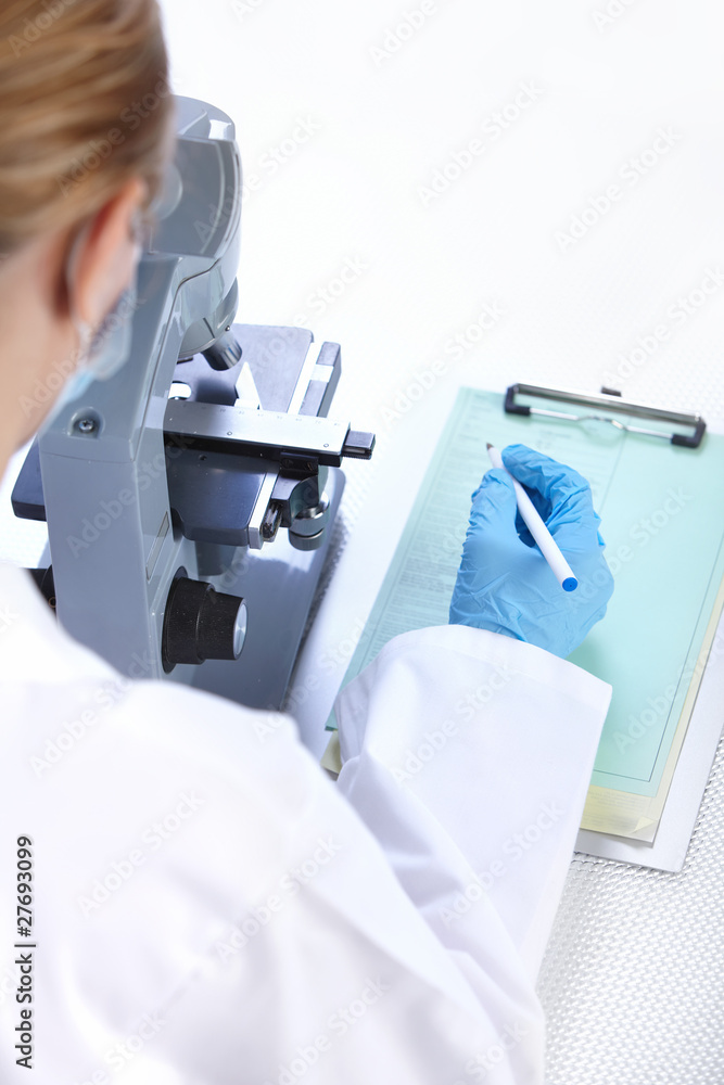 Woman with microscope Woman with microscope