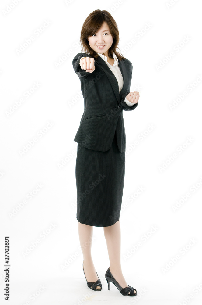 パンチする女性社員 パンチする女性社員