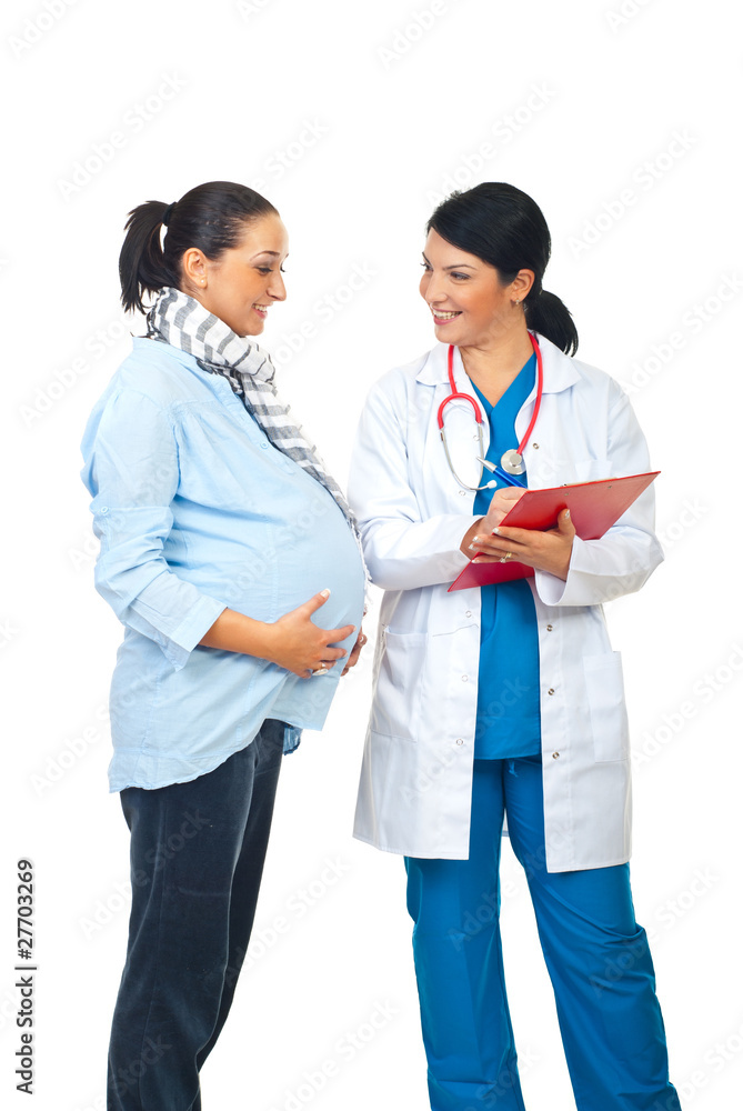 Cheerful pregnant and doctor having conversation Cheerful pregnant and doctor having conversation