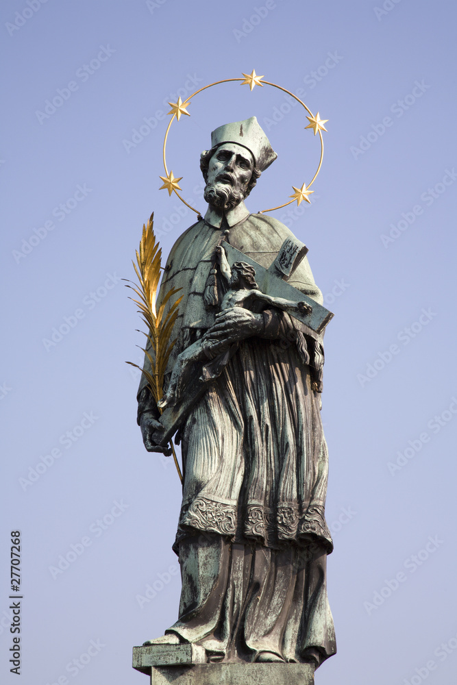 Prague- holy John Nepomuk statue on the Charles bridge