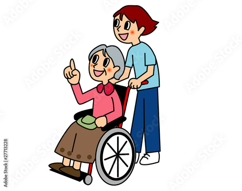 車椅子に乗る人と押す人