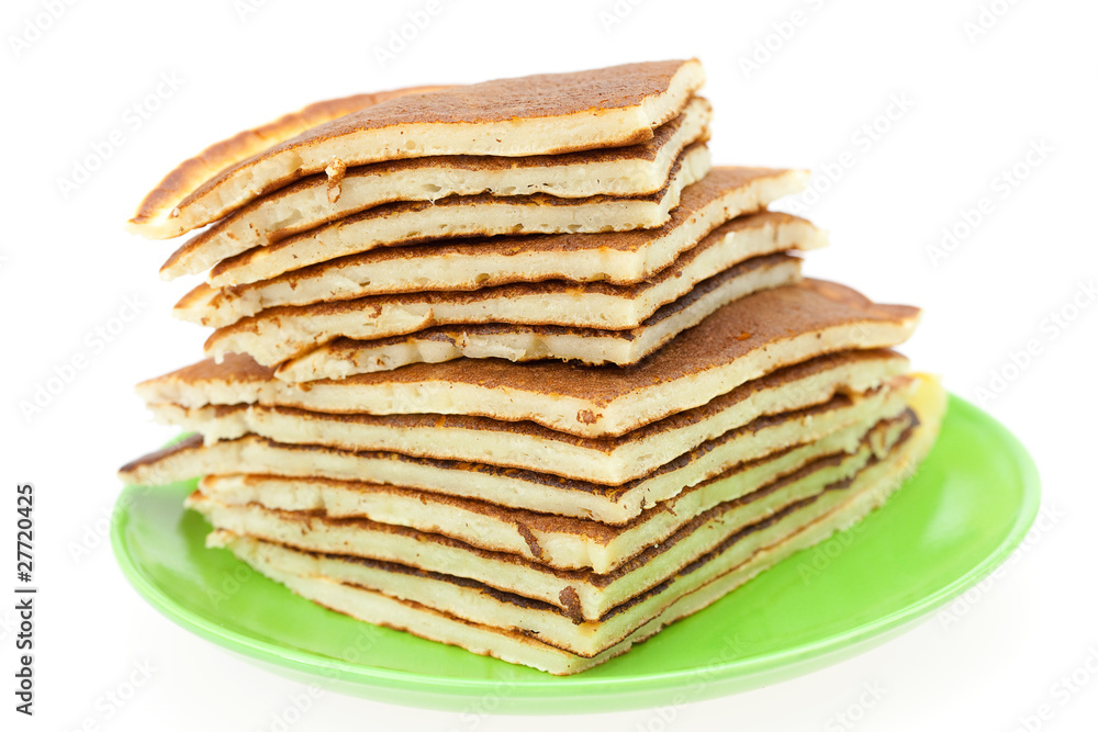Pancakes on a plate isolated on white Pancakes on a plate isolated on white