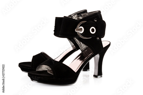 Beautiful female sexy black shoes on white