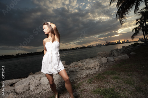 Woman posing during twilight time © Felix Mizioznikov
