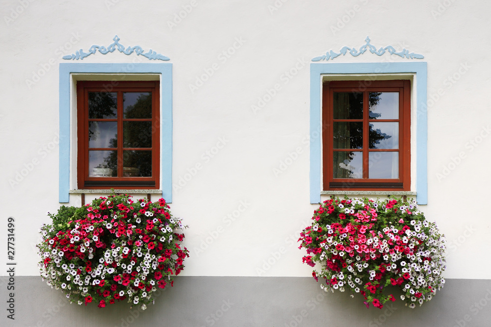 close-up two wood old windows with flowers close-up two wood old windows with flowers
