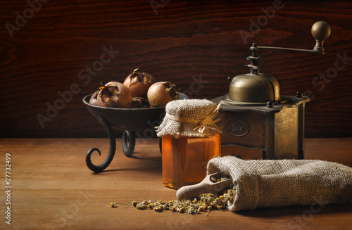 vintage still life with herbs and honey photo