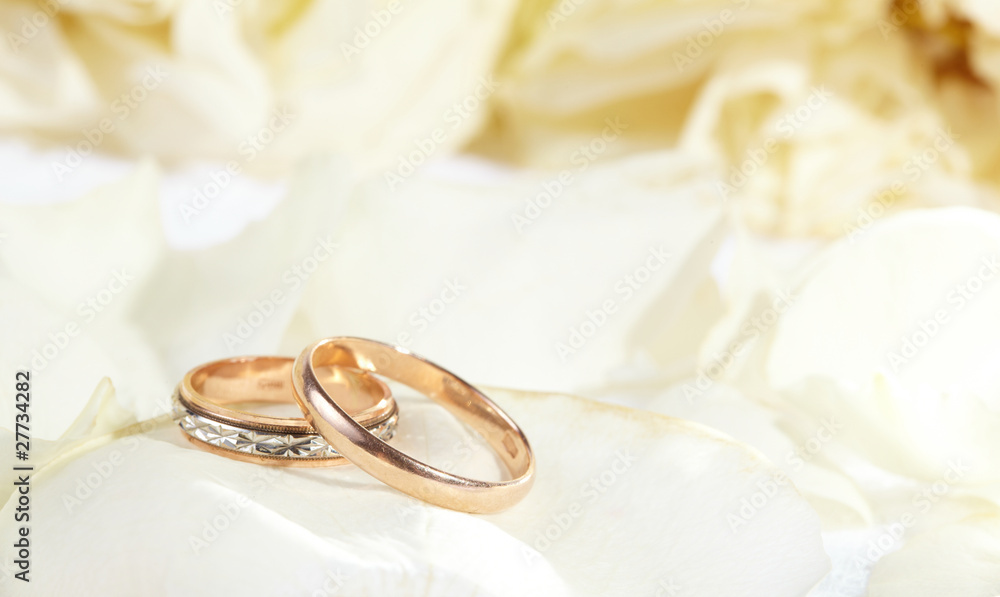 golden rings and rose petals golden rings and rose petals
