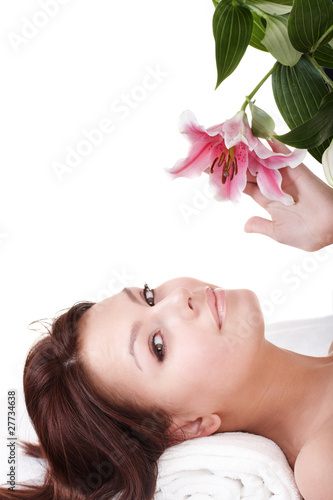 Beautiful young woman in spa. Isolated.