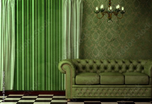 Foto Vintage interior featuring a chandelier and green leather sofa.