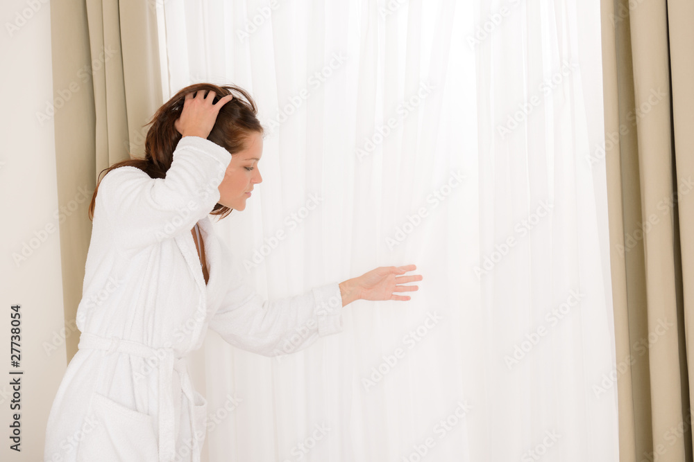 Morning bedroom - woman in bathrobe Morning bedroom - woman in bathrobe