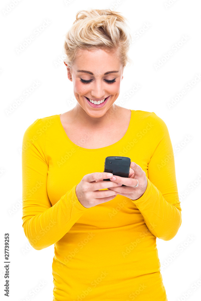 Attractive Woman looking and typing on Mobile Phone Attractive Woman looking and typing on Mobile Phone