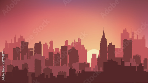 Sunset on the background of the city at night © AlexZel