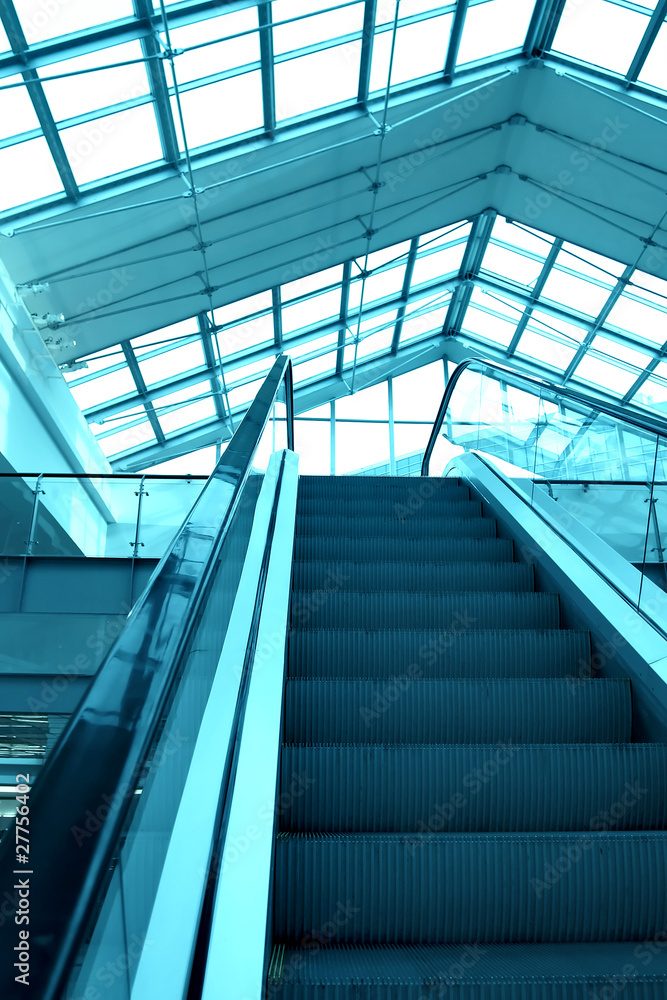 blue escalator in business center blue escalator in business center