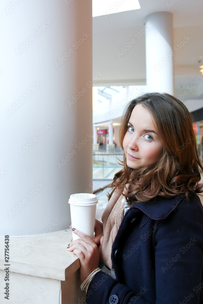 Shopping woman inside commercial center Shopping woman inside commercial center