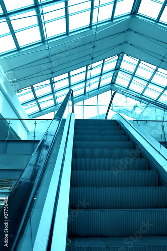 blue escalator in business center