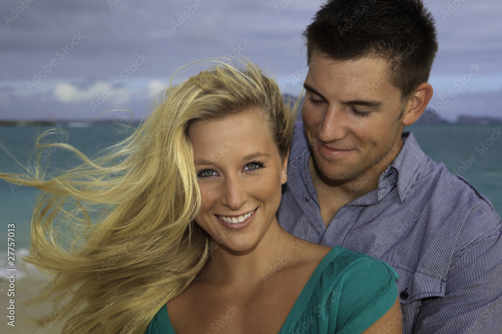 newly wed couple on the beach at Lanikai, Hawaii newly wed couple on the beach at Lanikai, Hawaii