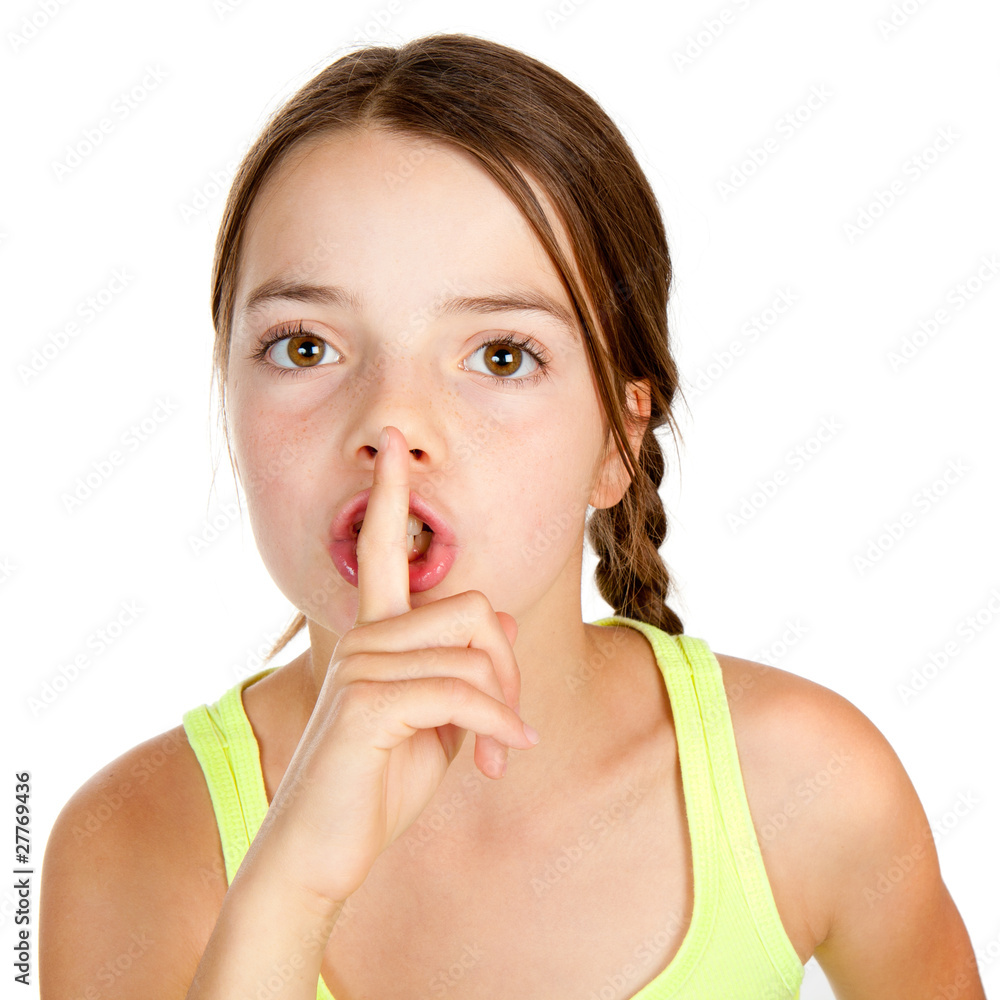Primary Aged Girl Making Shush Gesture Primary Aged Girl Making Shush Gesture
