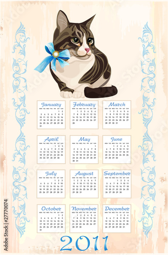 Fototapeta Naklejka Na Ścianę i Meble -  calendar 2011 with tabby cat