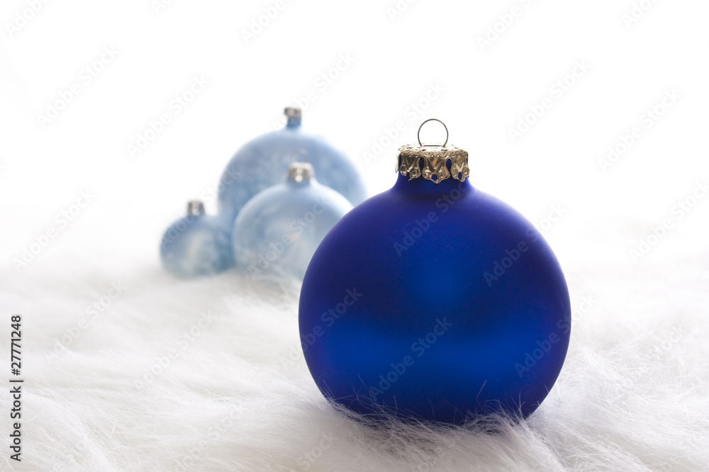 Some blue christmas baubles Some blue christmas baubles