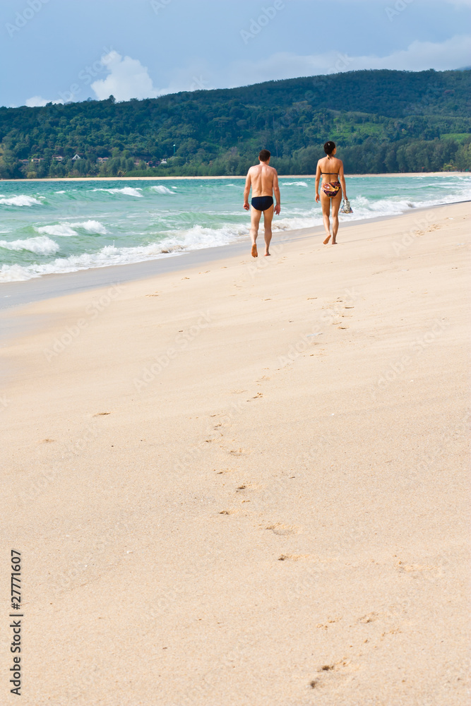 couple relaxing on beach