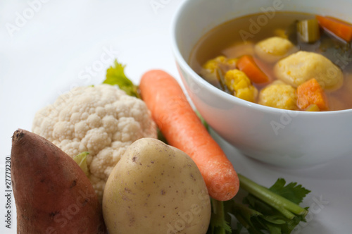 Vegetable and Soup in distance