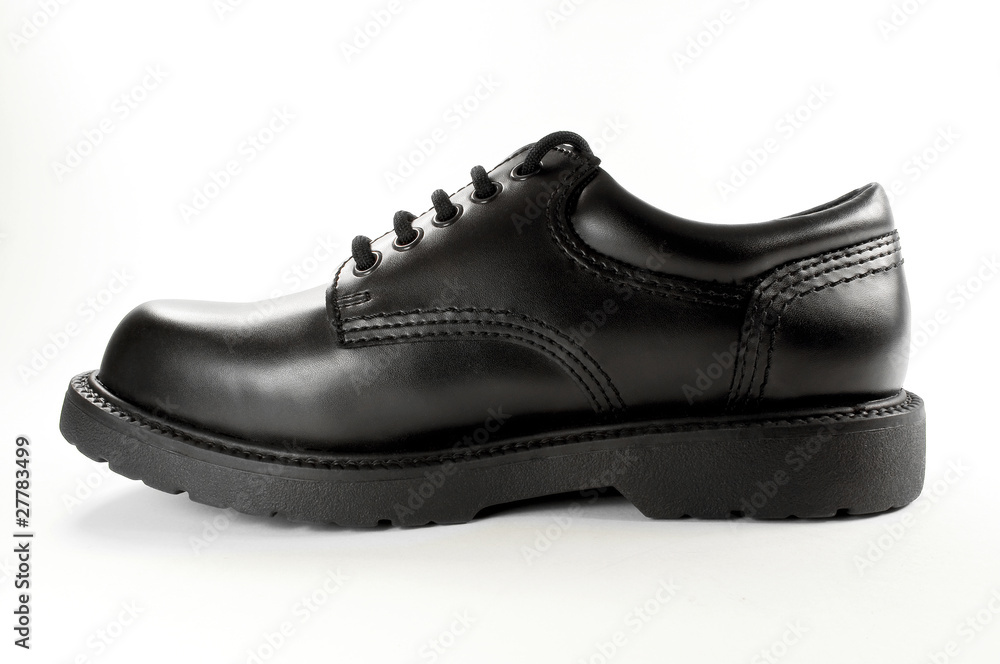 Black leather shoe. Black leather shoe.