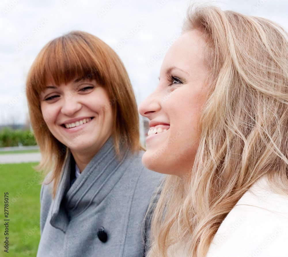 Two young girls smiling Two young girls smiling