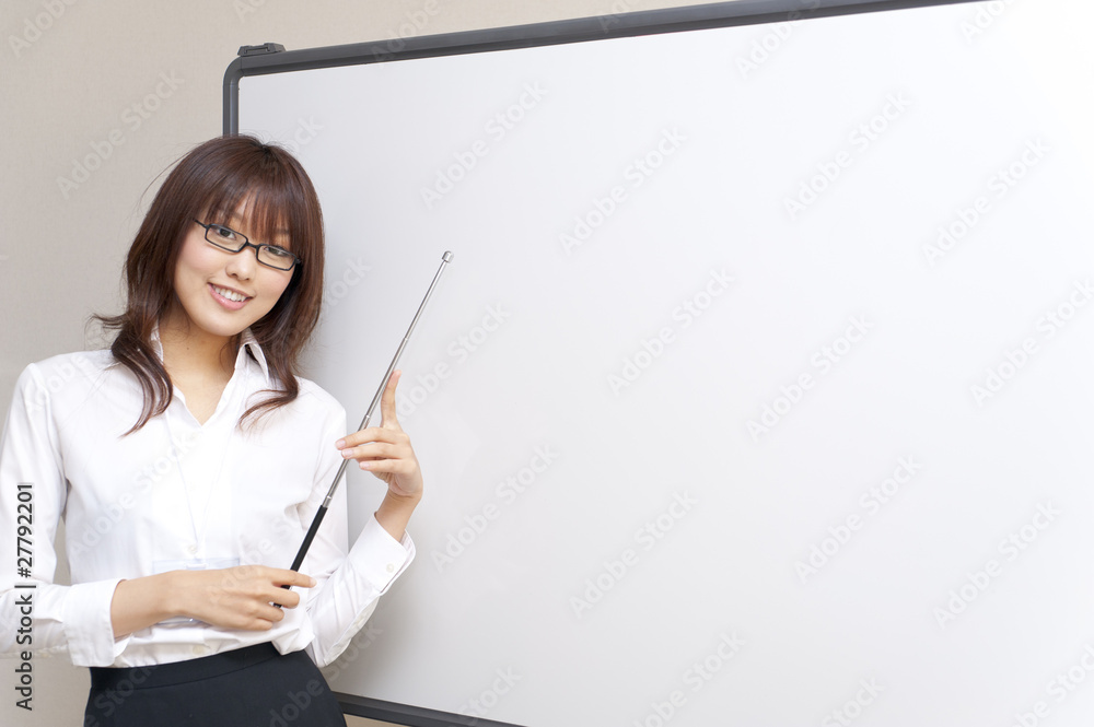 a portrait of young business woman and blank white board a portrait of young business woman and blank white board