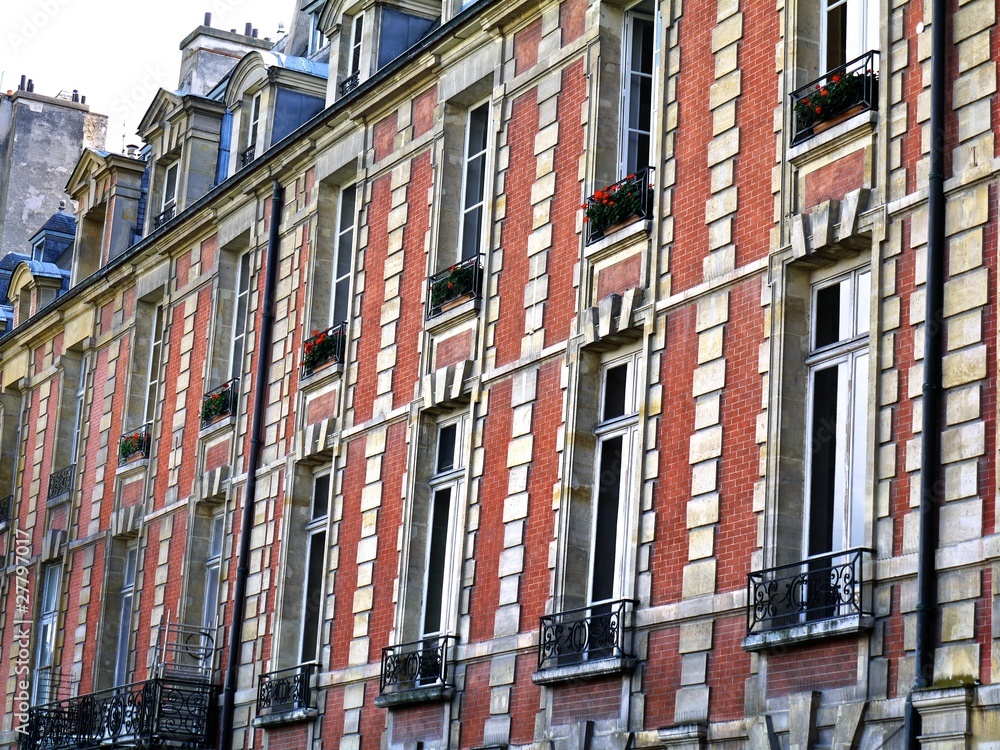 Naklejka premium Paris and the beautiful buildings of the Places des Vosges