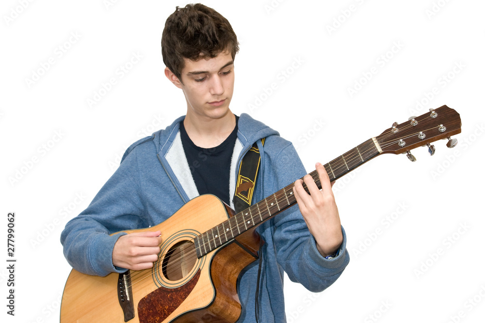 Teenager playing acoustic guitar on white background