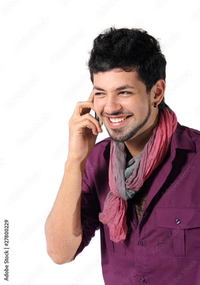 young man talking on the phone on the white young man talking on the phone on the white