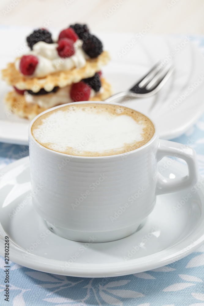 Cup of coffee and waffles with fruits Cup of coffee and waffles with fruits