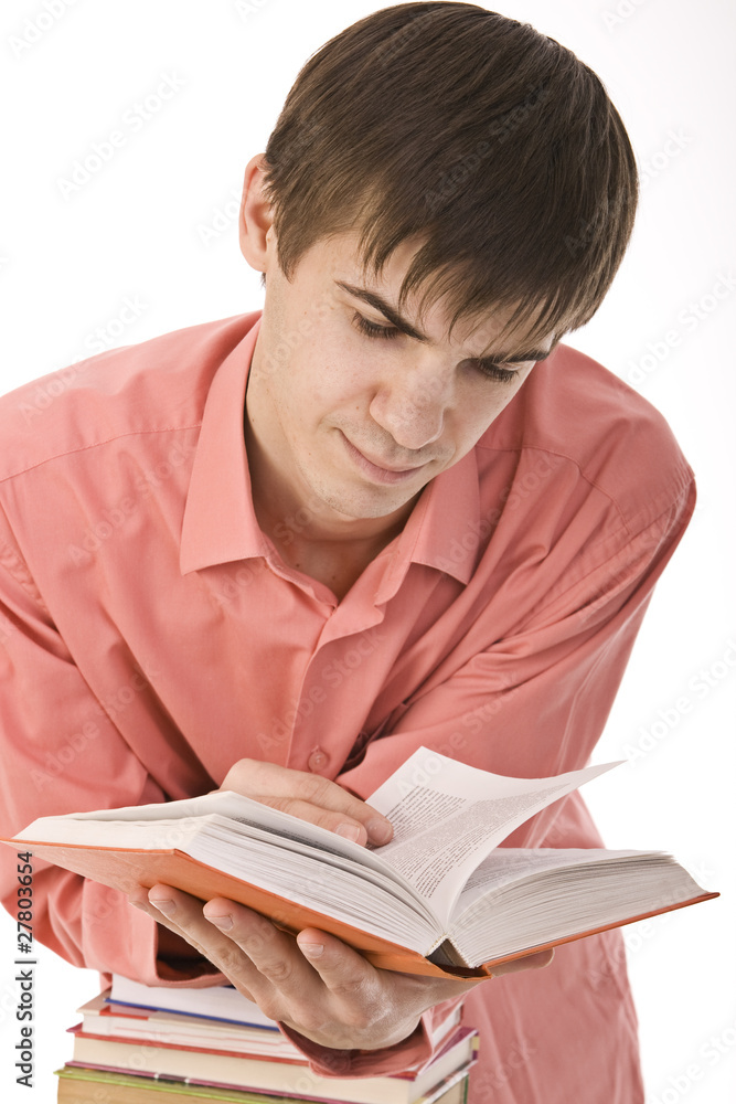young boy reading a book