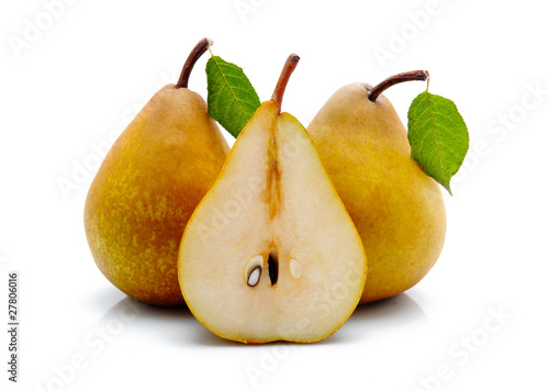 Yellow sliced pears with green leaf isolated