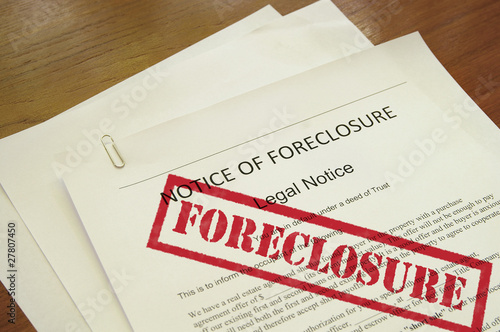 mortgage foreclosure document with red stamped text photo