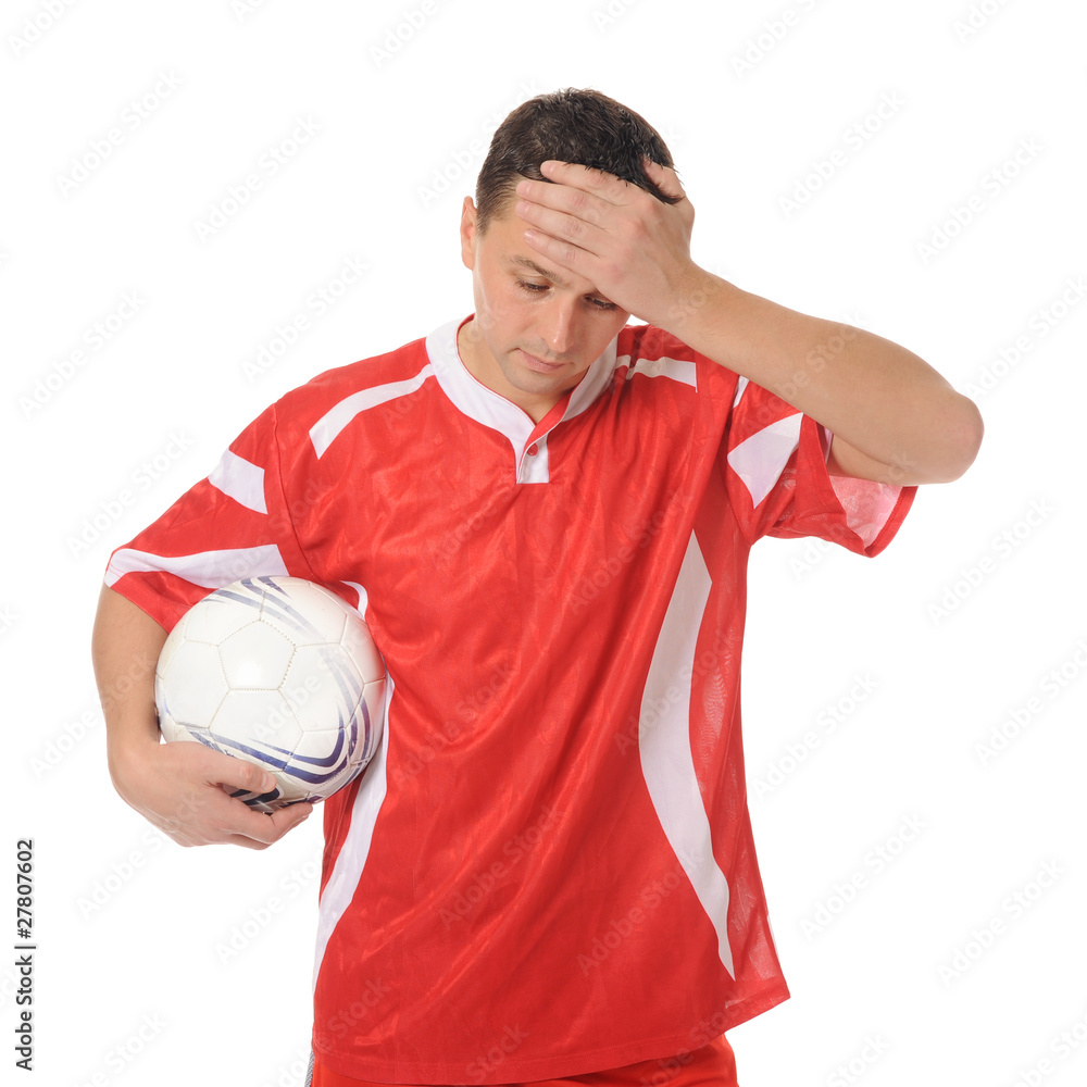 Upset soccer player in the red form.