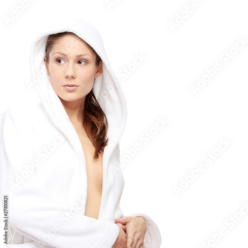 Young beautiful woman in bathrobe