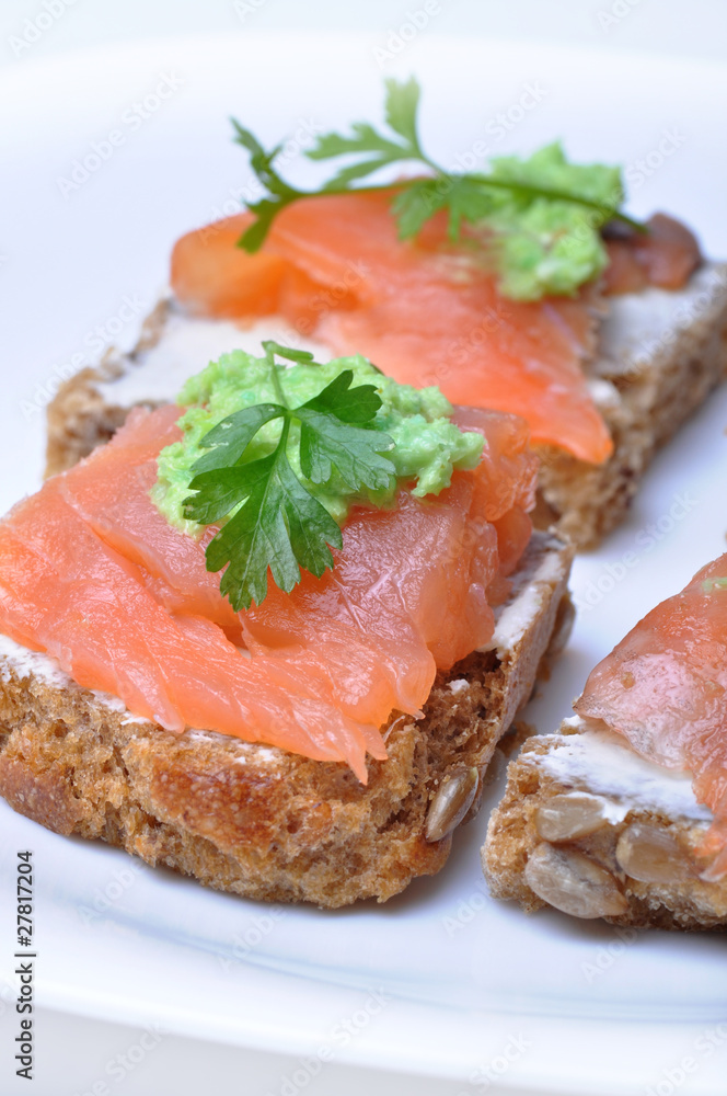 Sandwich with smoked salmon isolated Sandwich with smoked salmon isolated