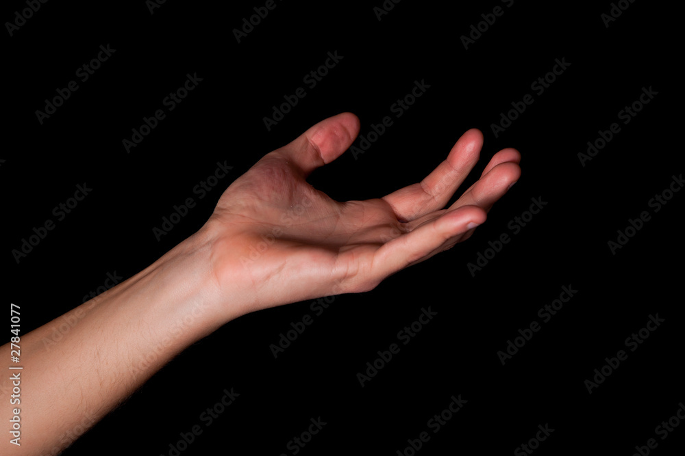 Fototapeta premium Male hand on black background